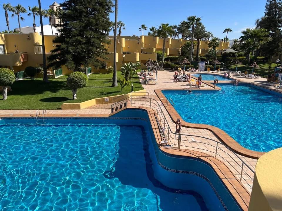 Atlantic Garden Andrew Apartments Pool Air Conditioning كوراليهو المظهر الخارجي الصورة